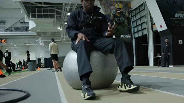 Deion Sanders showing off Nike Diamond Turf